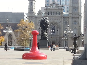 Game piece with City Hall in background